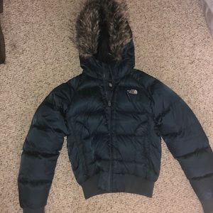 Navy blue women’s North Face puffer jacket